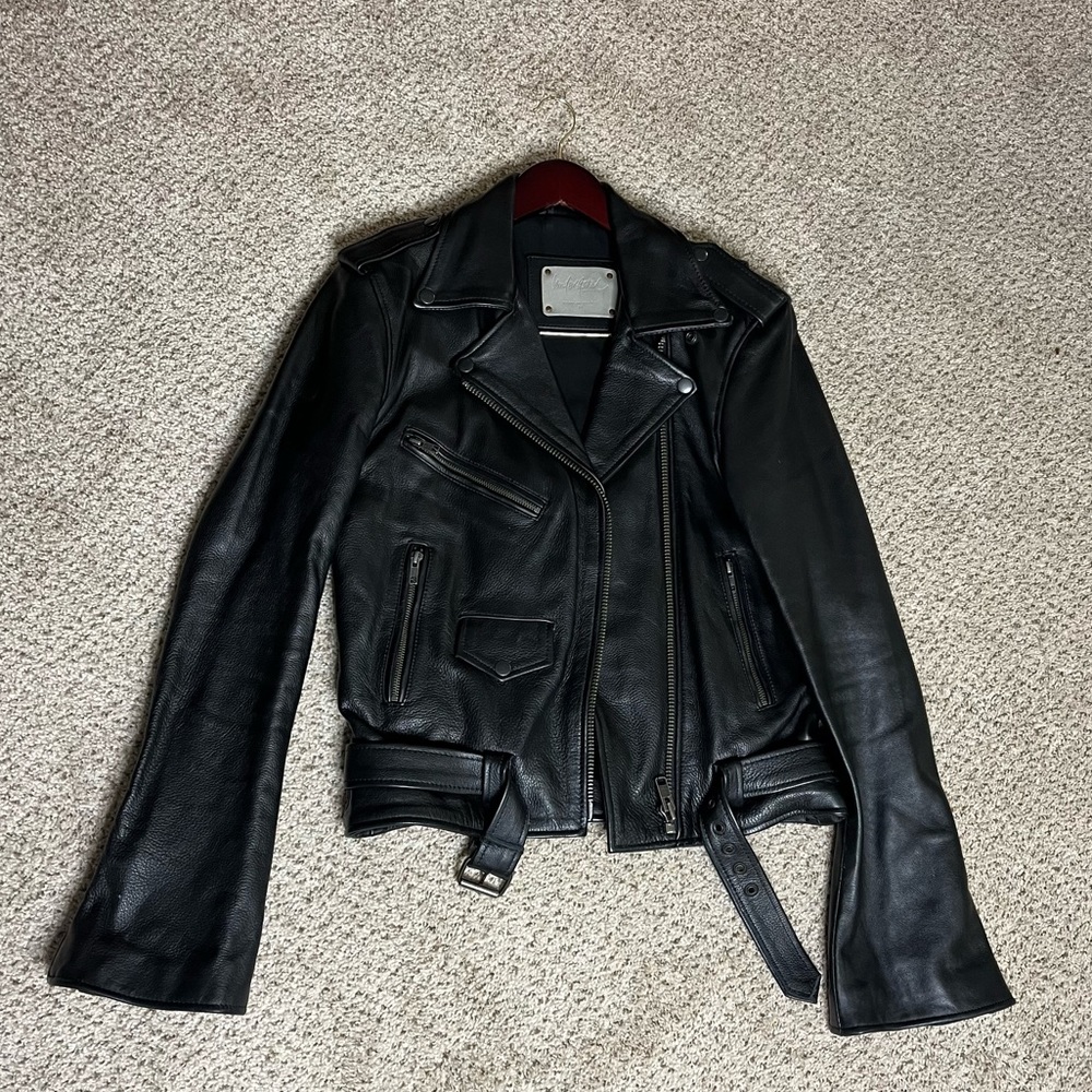 Understated Leather extreme bell sleeve genuine leather.